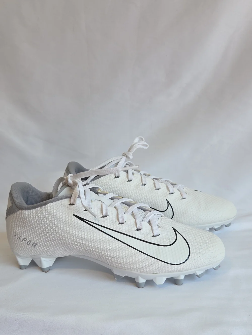Nike Men’s White & Gray Football Cleats with Black Swoosh